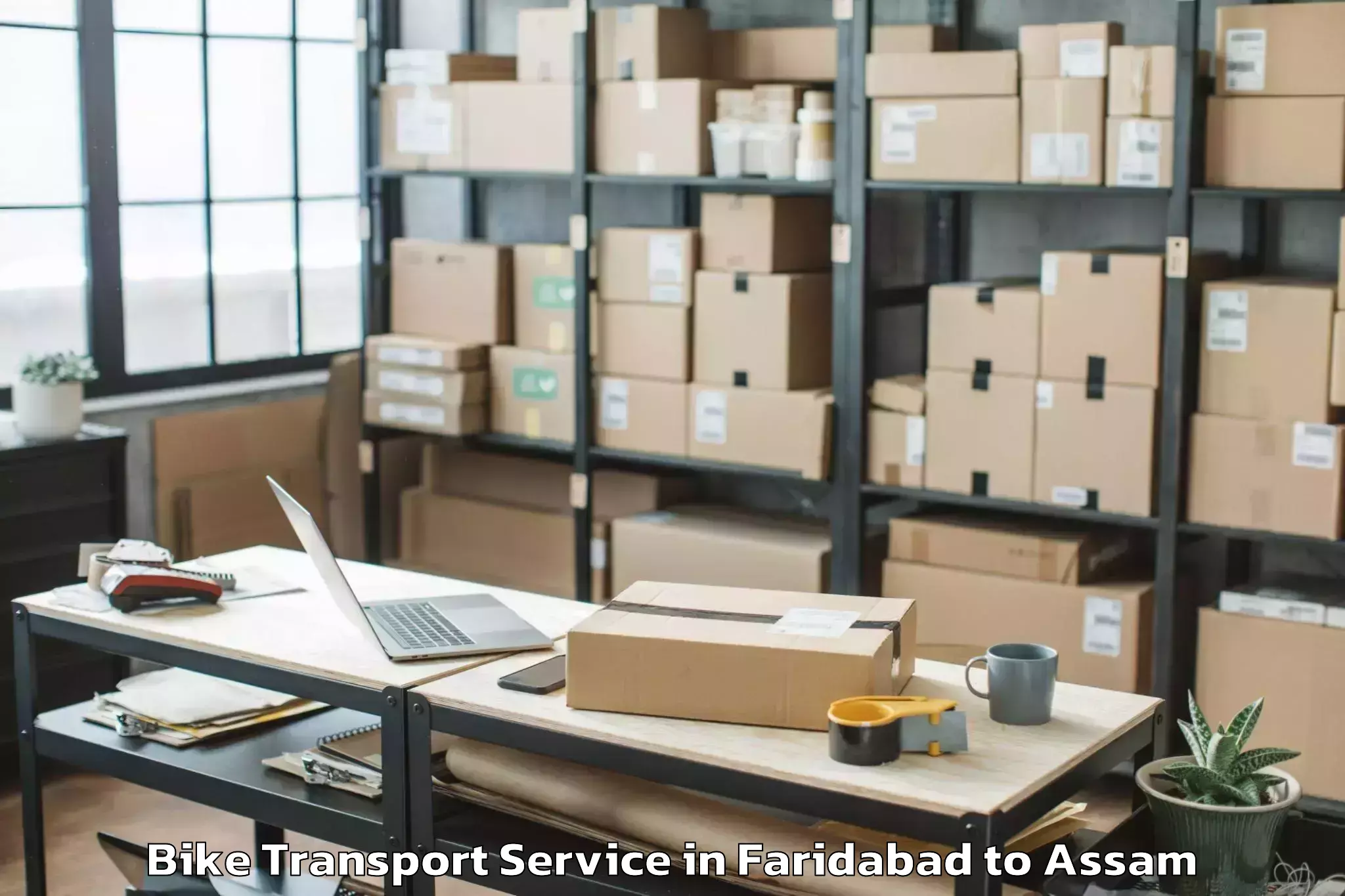 Top Faridabad to Gauhati University Guwahati Bike Transport Available